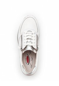 White leather sneaker with silver accents, a round toe, front laces, and side zipper. Soft insole with a curved logo pattern.