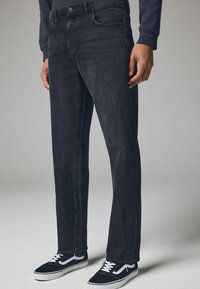 Next VINTAGE STRETCH AUTHENTIC REGULAR FIT - Traperice ravnih nogavica - black vintage
