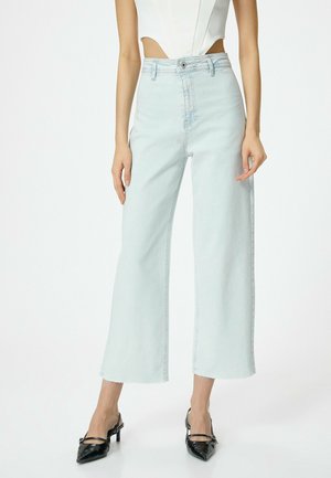 WIDE CROP LEG JEAN. - Flared-farkut - blue denim