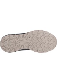 Suola nera di scarpa sportiva con una suola esterna in gomma beige e resistente, caratterizzata da motivi di trazione e il marchio inciso "WHISTLER" al centro.