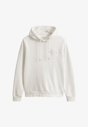 Sweat à capuche blanc type pullover avec poche kangourou à l’avant, capuche avec cordon, poignets et ourlet côtelés, avec un logo discret en relief sur la poitrine.