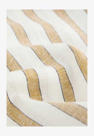 Tejido de tela con franjas delgadas alternas de beige, blanco y negro. La textura parece suave con un ligero brillo.