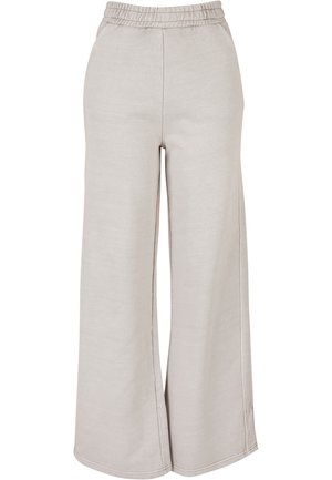 Lichtgrijze wijde broek van zacht materiaal met een elastische tailleband en zijslitsen, met een gladde textuur en een minimalistisch ontwerp.