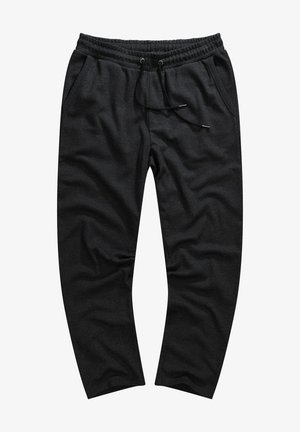 Pantaloni jogger neri realizzati in tessuto texturizzato; presentano una vita elasticizzata, cordino e tasche laterali.