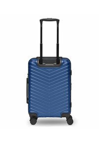 Valigia rigida compatta di colore blu navy, caratterizzata da un motivo a chevron, maniglia retrattile e quattro ruote per una facile manovrabilità.