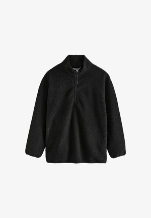 Sudadera de forro polar negra con cuello de cremallera de cuarto, mangas largas y una superficie suave y texturizada. Diseño minimalista sin patrones ni acentos.