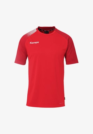 Rode sportshirt met korte mouwen van Kempa, gemaakt van een gladde stof. Voorzien van een zwarte rondhals en een getextureerd geometrisch patroon op de schouder.