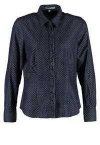Chemise bleu marine à boutons avec manches longues, présentant un motif à pois et une texture lisse. Col classique et fermeture avant à boutons.