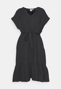 Vestido negro de longitud hasta las rodillas, hecho de una tela ligera. Presenta un escote en V, mangas cortas, una cintura elástica con un lazo y un dobladillo acampanado.