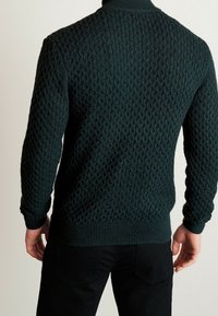 Next Sweter