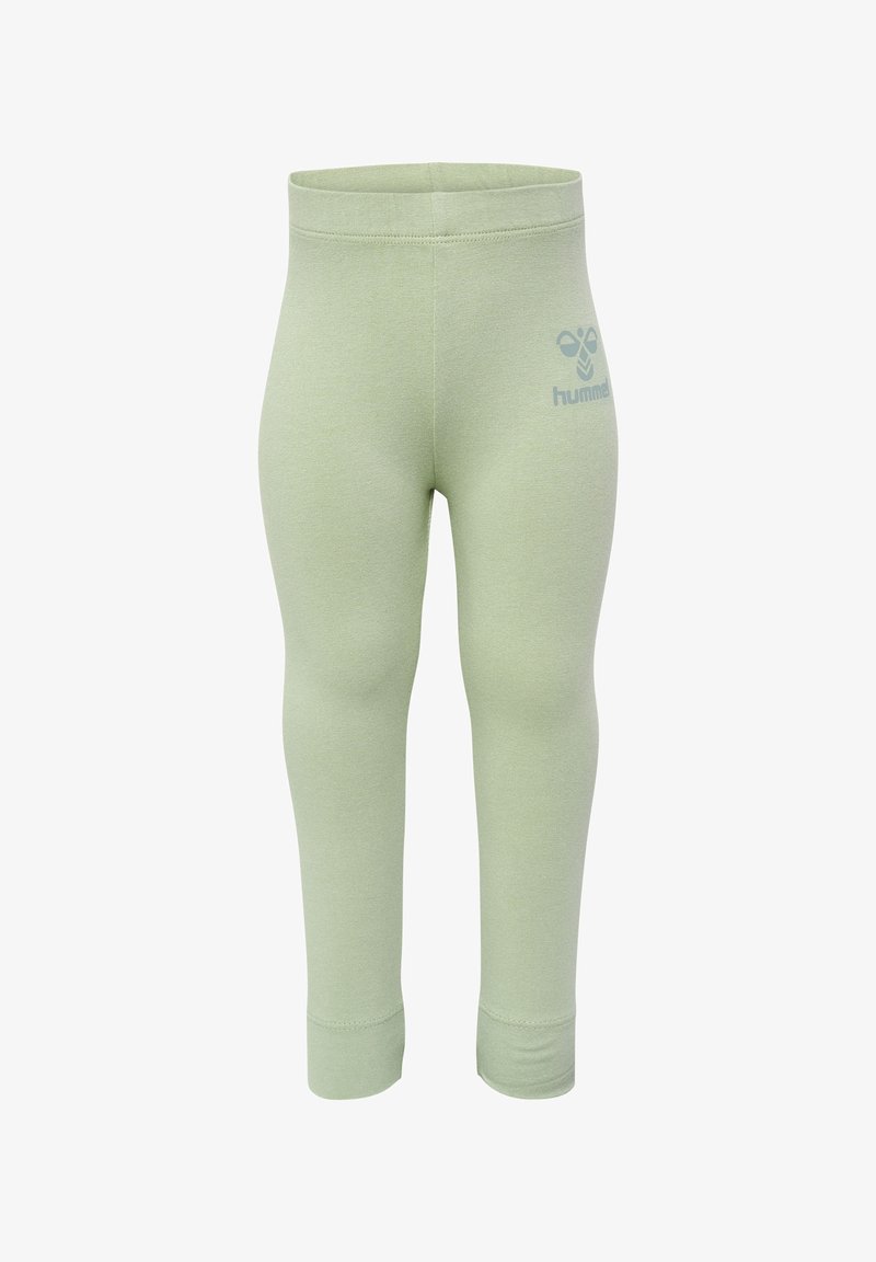 Ljust gröna leggings i stretchigt material, med en tajt passform och resårmidja; inkluderar en liten logotyp på sidan.