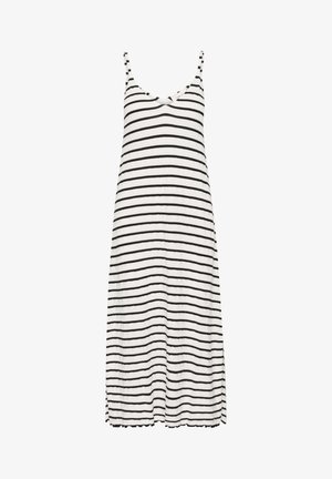 Striped dress with a scoop neckline and thin shoulder straps. Features black and white horizontal stripes and scalloped hemline.
