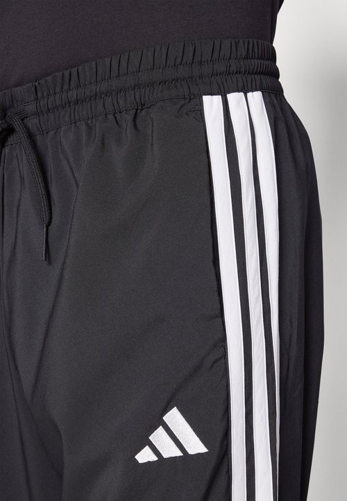 adidas ESSENTIAL THREE STRIPES - Tracksuit bottoms - black/white — foto 6