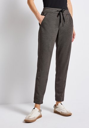 MELANGE - Tracksuit bottoms - braun