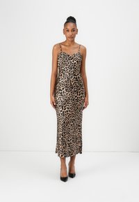 Leopard print satin slip dress with spaghetti straps, fitted design, and a flowing hem. Features a smooth texture and neutral color palette.
