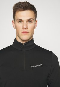 Peak Performance CHASE HALF ZIP SALUTE - Tops ar garām piedurknēm - black