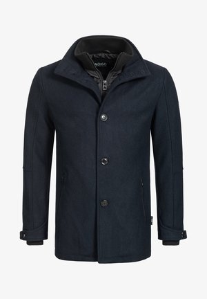 Dark navy wool blend coat with a pointed collar, button closure, side pockets, and ribbed cuffs. Features a quilted inner lining.