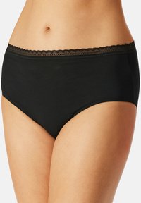 Culotte noire taille haute en tissu doux, avec une bordure en dentelle à festons au niveau de la taille et une texture lisse sur l'ensemble.