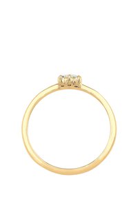 Guld ring med en glat, afrundet skæfte og en kluster af tre klare sten indsat i en prong-mount øverst.