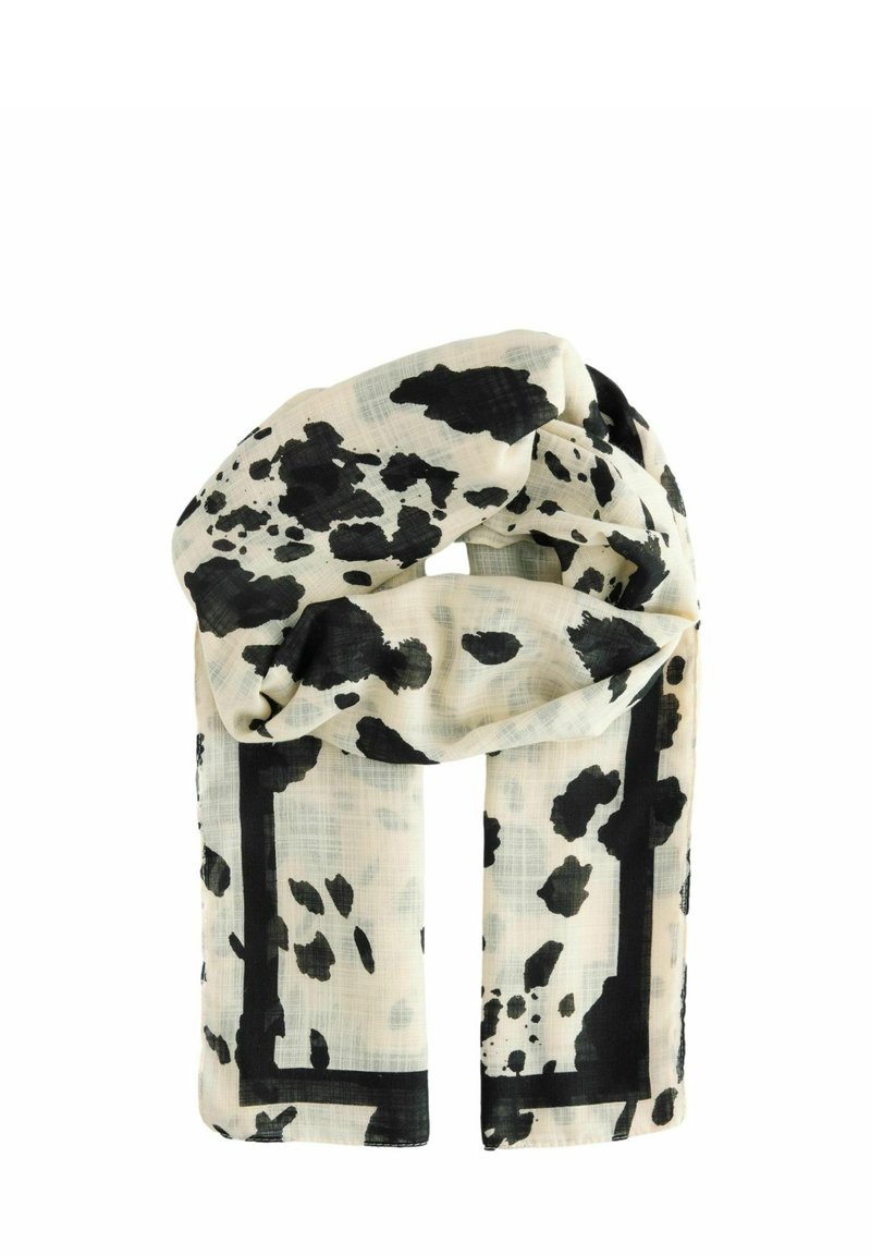 Foulard léger et transparent en crème avec des taches noires abstraites et un design de bordure rectangulaire, offrant une texture douce et lisse.