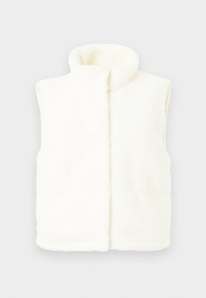 White fleece vest with high collar, sleeveless design, textured surface, and front seam detailing. Soft and warm material.