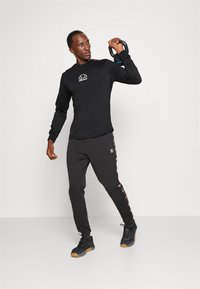 Ellesse NIOMA TEE - Camisola de manga comprida - black