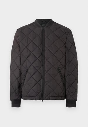 Black quilted bomber jacket with zip closure, ribbed collar and cuffs, and zippered side pockets, displayed against a white background.