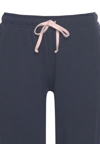 Marineblaue Baumwoll-Jogginghose mit elastischem Bund, ausgestattet mit einer hellrosa Kordel zum Verstellen. Glatte Textur, keine sichtbaren Muster.
