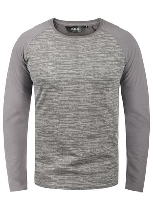 Long-sleeve t-shirt in light and dark gray shades, featuring a textured body and smooth sleeves. Crew neck design with raglan style.