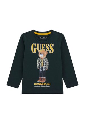 Juoda medvilninė marškinėlė su ilgomis rankovėmis, vaizduojanti lokį, vilkintį plaid tipo drabužius, geltonais akcentais ir tekstu "GUESS" bei "LOS ANGELES EST. 1981."