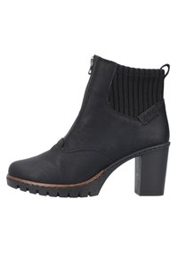 Černé kotníkové boty na středním podpatku se bočním zipem a ribbed elastickým lemem, s hrubou podrážkou a poutkem na zadní straně.