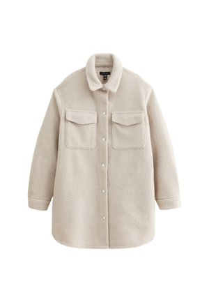 Beige fleece shirt jacket with a collar, button closures, two chest pockets, and relaxed fit. Smooth texture and slightly oversized design.
