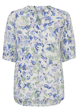 Kwiatowa bluzka z dekoltem w serek, z fioletowymi, niebieskimi i zielonymi wzorami na jasnym tle. Krótkie, zwiewne rękawy i zaokrąglony dół.