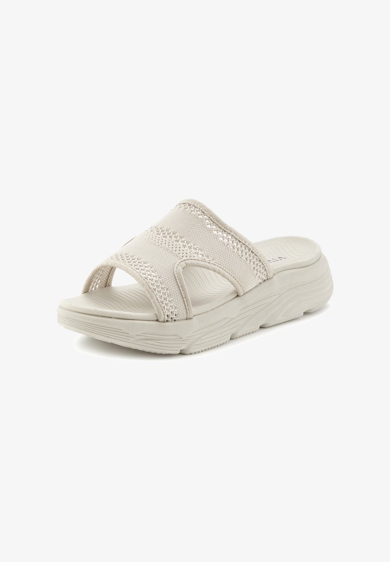 Light beige sandals with a textured, breathable fabric upper. Open-toe design and thick sole for comfort. Flat sole with subtle tread pattern.