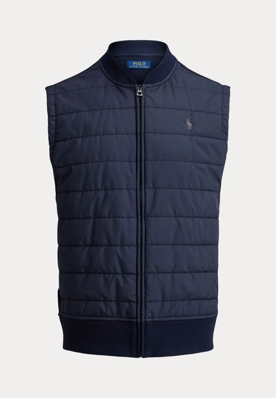 Veste matelassée bleu marine avec sections matelassées, col montant, fermeture éclair avant et petit logo brodé sur la poitrine.