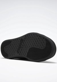 Black rubber sneaker sole with a textured, diamond-pattern tread and raised Reebok logo. Flat design with no visible stitching or accents.