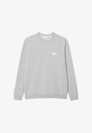 Light gray sweatshirt, crew neckline, long sleeves, soft fabric, features a white embroidered crocodile logo on the left chest.