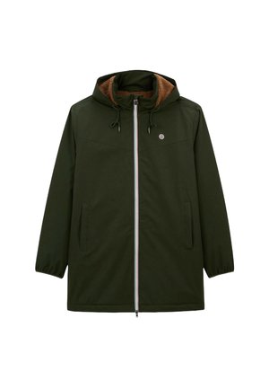 Olijfgroene jas met capuchon, ritssluiting aan de voorkant en twee zijzakken. Binnenin gevoerd met bruine faux fur voor extra warmte.