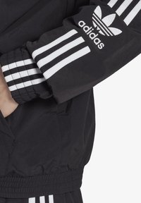 adidas Originals LOCK UP - Tréning dzseki - black