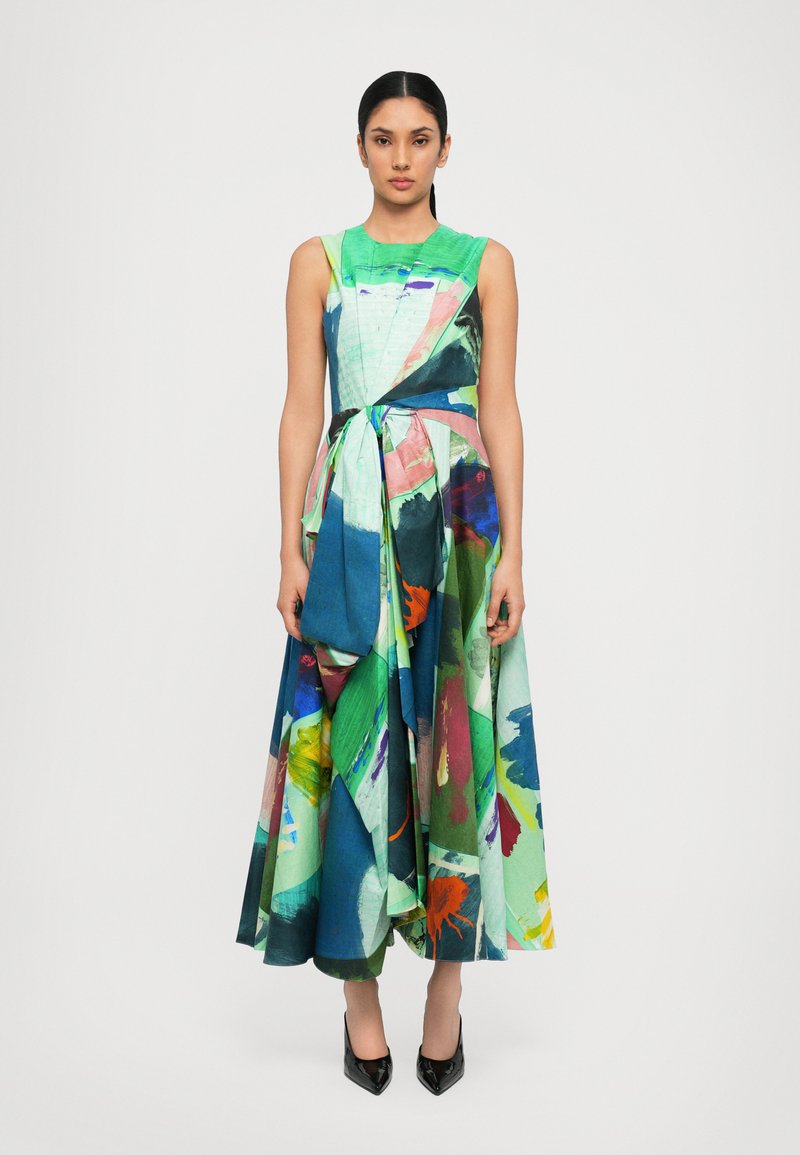 Multicolored sleeveless dress with abstract floral patterns in greens, blues, and pinks; features a cinched waist and flowing skirt.