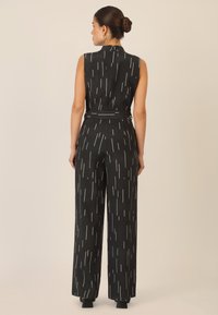 Apart OVERALL - Tuta jumpsuit - schwarz creme