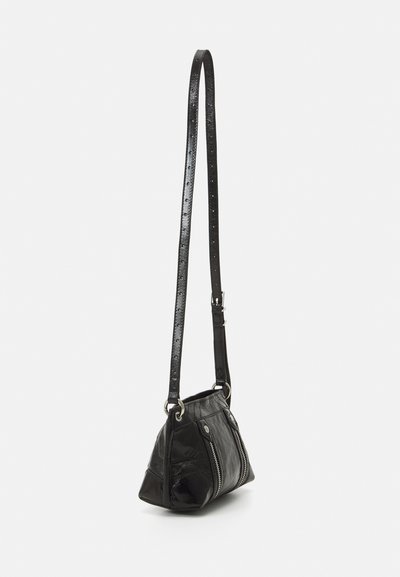 Black leather shoulder bag with a glossy finish, featuring a zipper closure, textured sides, and an adjustable strap for versatile wear.