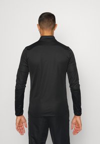 Nike Performance M NK DRY ACD21 TRK SUIT K - Fato de treino - black/laser orange