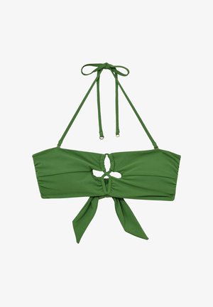 Žalias bikini viršus su stačiakampio forma, išpjautu centru ir reguliuojamomis petnešėlėmis. Medžiaga yra lygi ir tampri, surišta nugaroje.