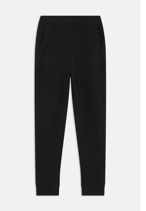 Pantalons de survêtement noirs en tissu doux, dotés de poches latérales, de poignets côtelés et d'un petit logo sur la jambe gauche.