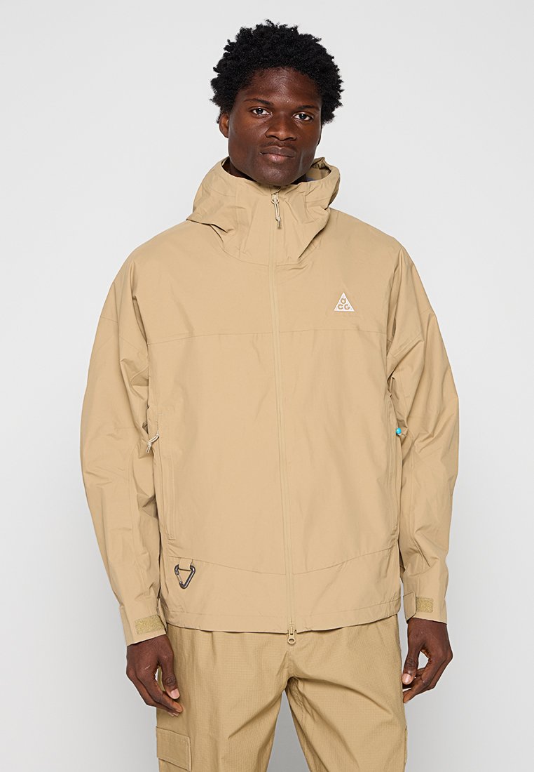 Nike Sportswear Regenjas beige Nike Sportswear Regenjas beige