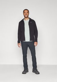 Helly Hansen SKOG GRAPHIC - Triko s potiskem - green mist