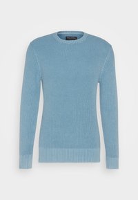 Helles blaues Strickpullover mit Rundhalsausschnitt, gerippten Bündchen und Saum. Texturiert mit einem subtilen Muster, entworfen für eine taillierte Silhouette.