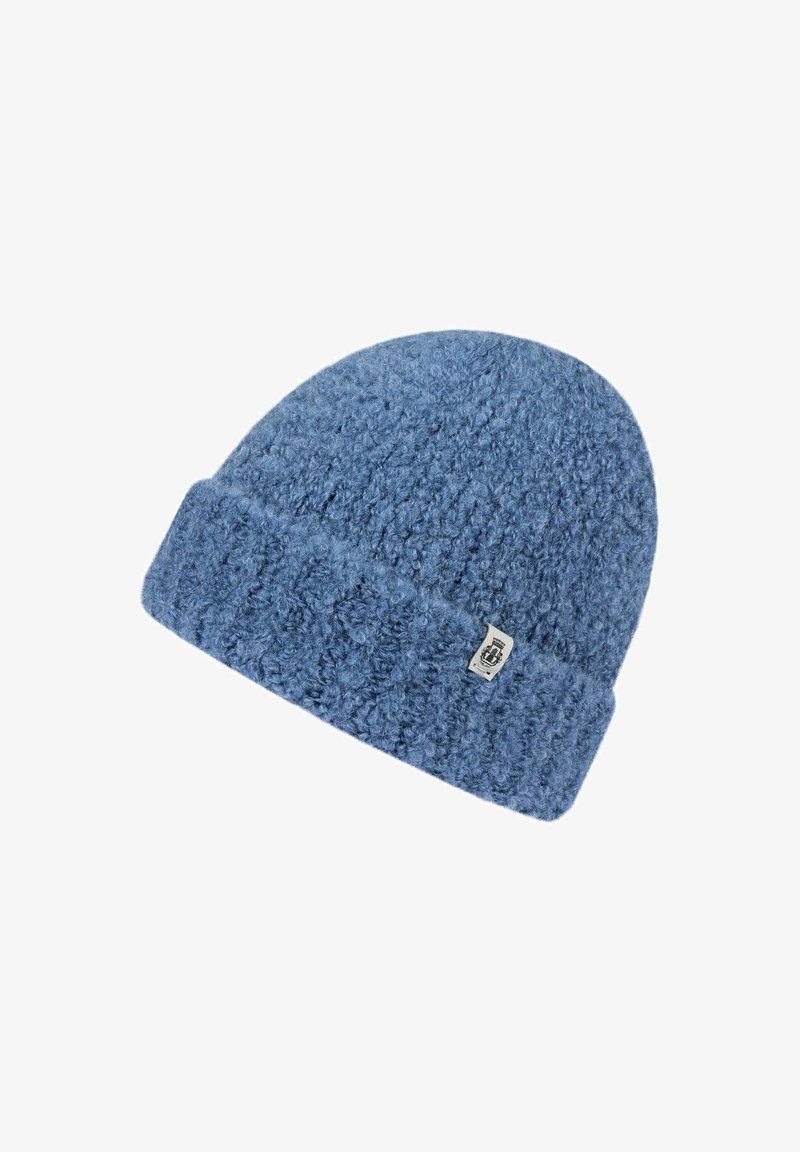 Blue knitted winter beanie with a textured pattern and a small white fabric label on the folded cuff.