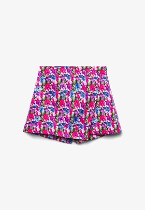 Floraler Skort mit leuchtend pinken, violetten, blauen Blumen und grünen Blättern auf weißem Hintergrund, flach auf einer weißen Oberfläche liegend.